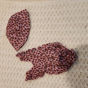 Gap 0-3 mos. Purple floral romper with matching sun hat.